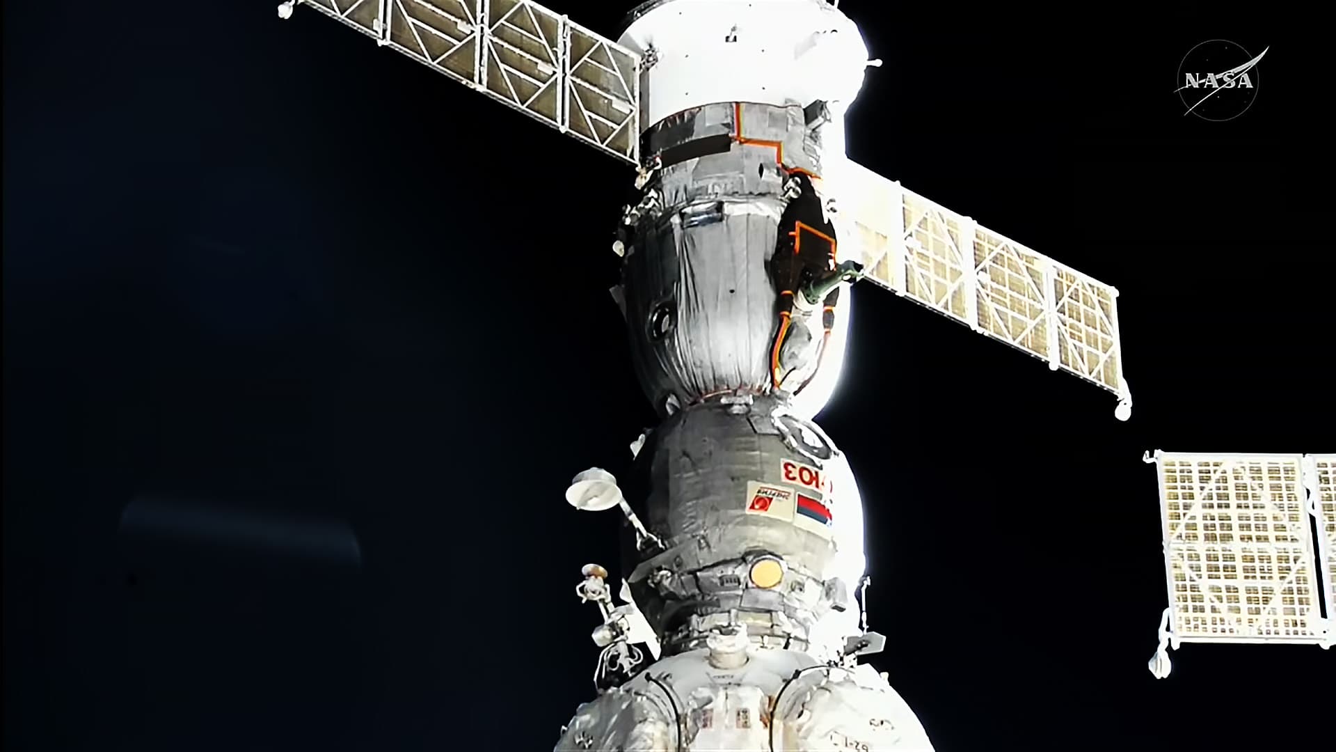 Live on NASA+: Soyuz Crew Undocking from Station Soon