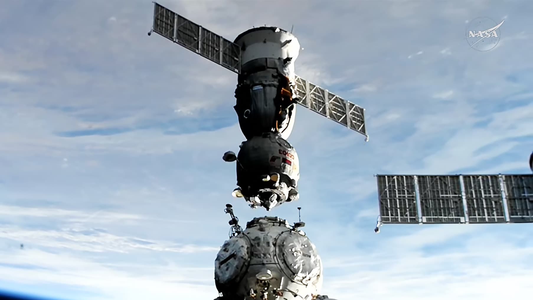 Soyuz Undocks from Station, Crew Heads for Earth Return