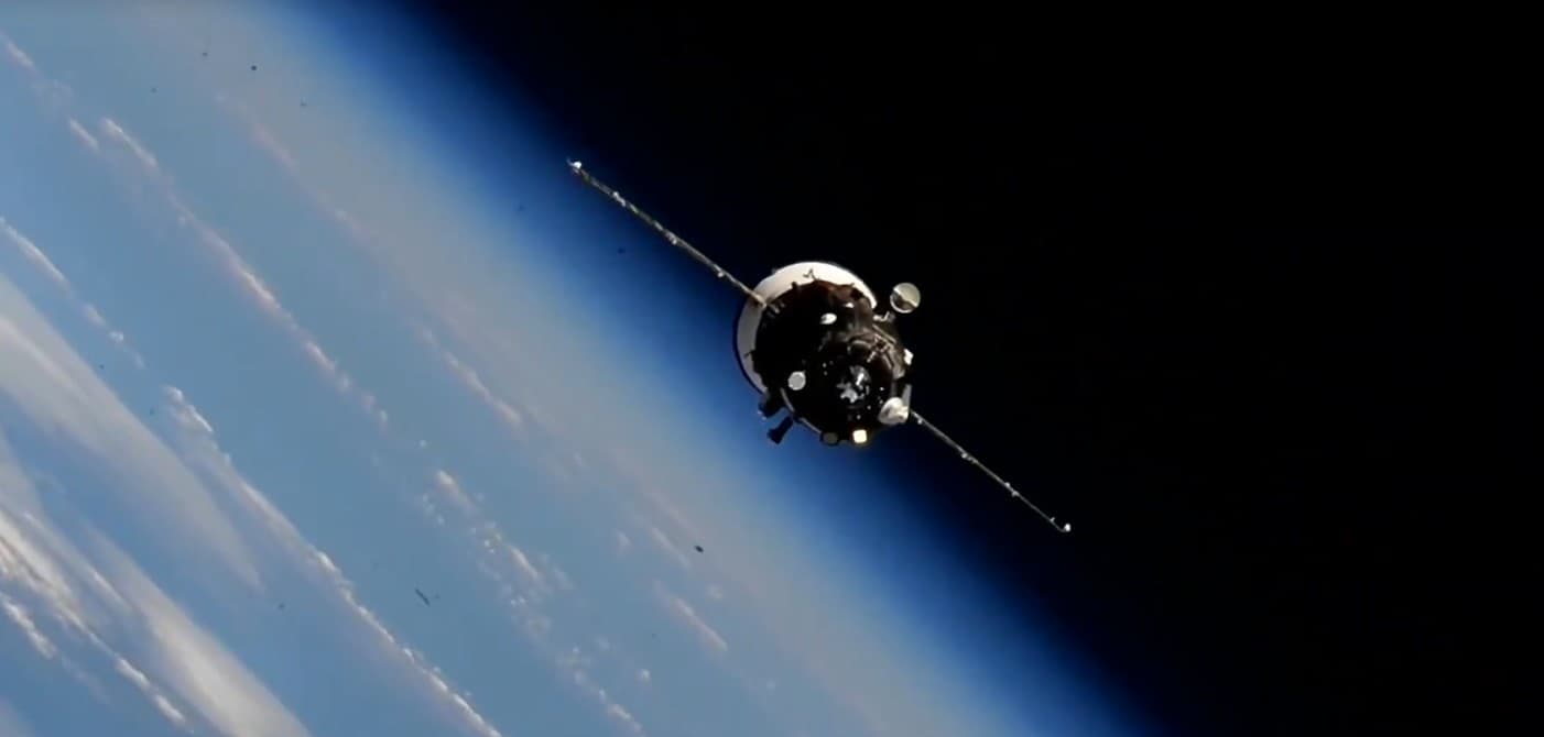 Progress Cargo Craft Docks to Station Resupplying Crew