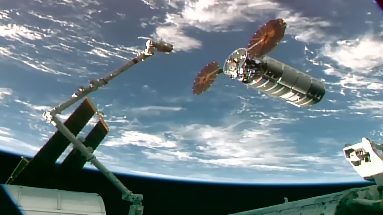 Canadarm2 Reaches Out and Captures Cygnus XL Cargo Craft